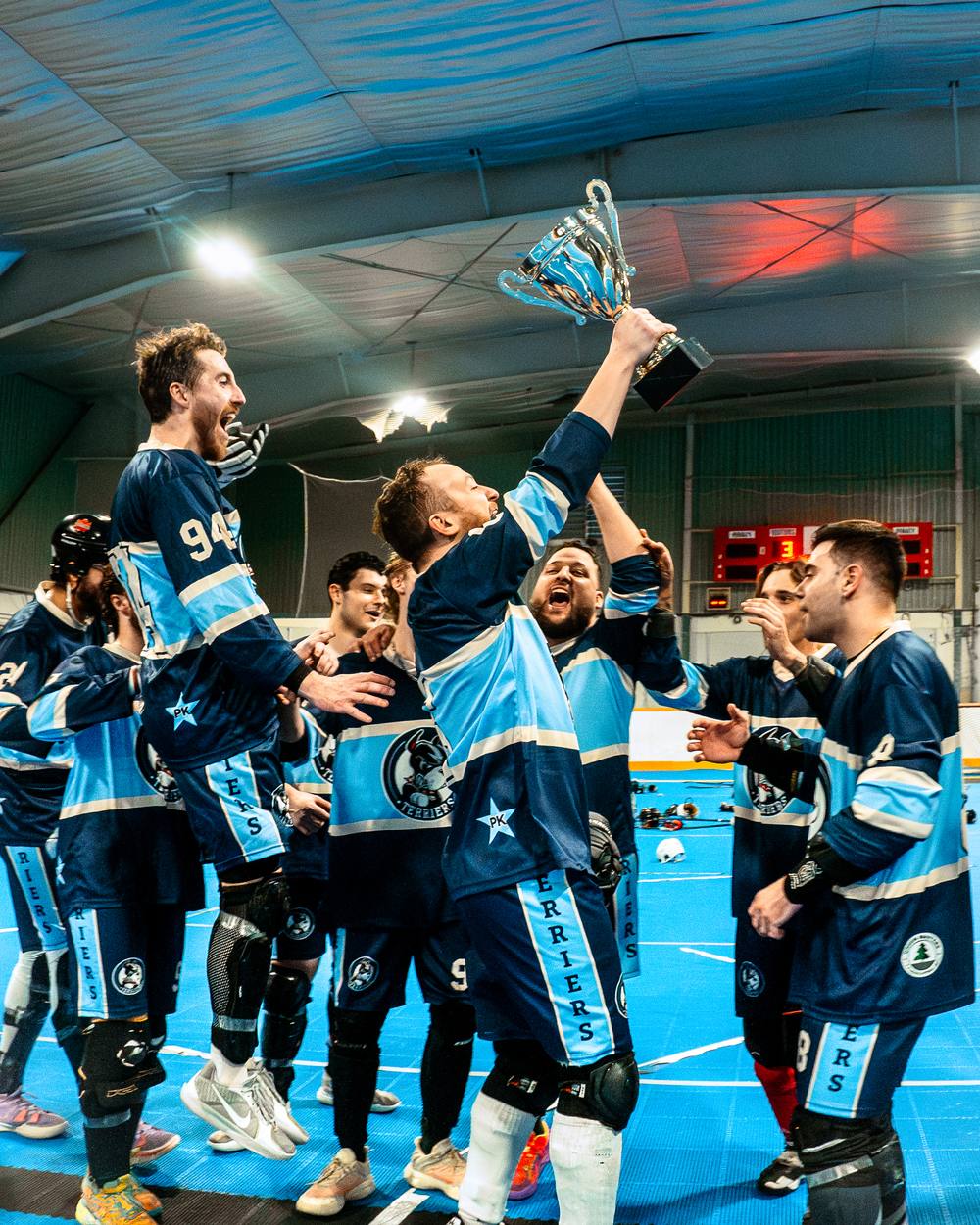 Champions lifting the Dominion Cup at Haig Bowl Arena
